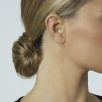 Pendientes-riviere-oro-blanco-diamantes-garra - Ref J5720PB_Chocrón Joyeros