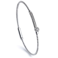 Pulsera_rígida_bubbles_oro_blanco_diamantes_roseta_movil_ Ref J5320PLB_Chocrón Joyeros