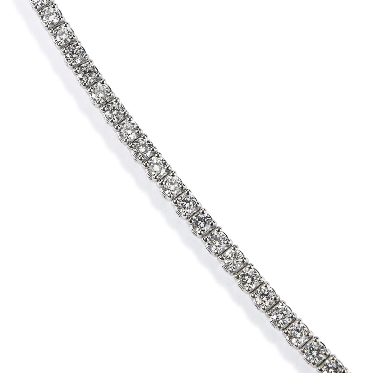 Pulsera-riviere-oro-blanco-diamantes-brillantes-garra Ref J5396PLB_Chocrón Joyeros