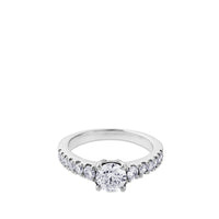 Solitario de oro blanco con diamante talla brillante y montura con diamantes