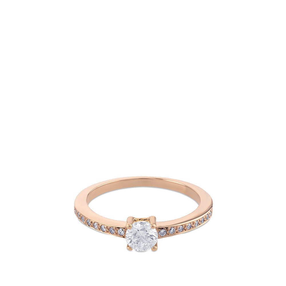 Solitario de oro rosa con diamante central en garra y pavé en montura