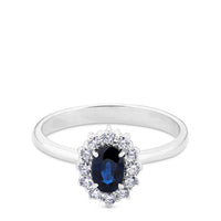 Sortija "Royal Trilogy" de oro blanco con zafiro y orla de diamantes