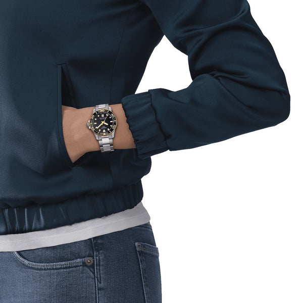 Tissot_seastar_1000_negro_dorado_36mm_vista_modelo_T1202102105100