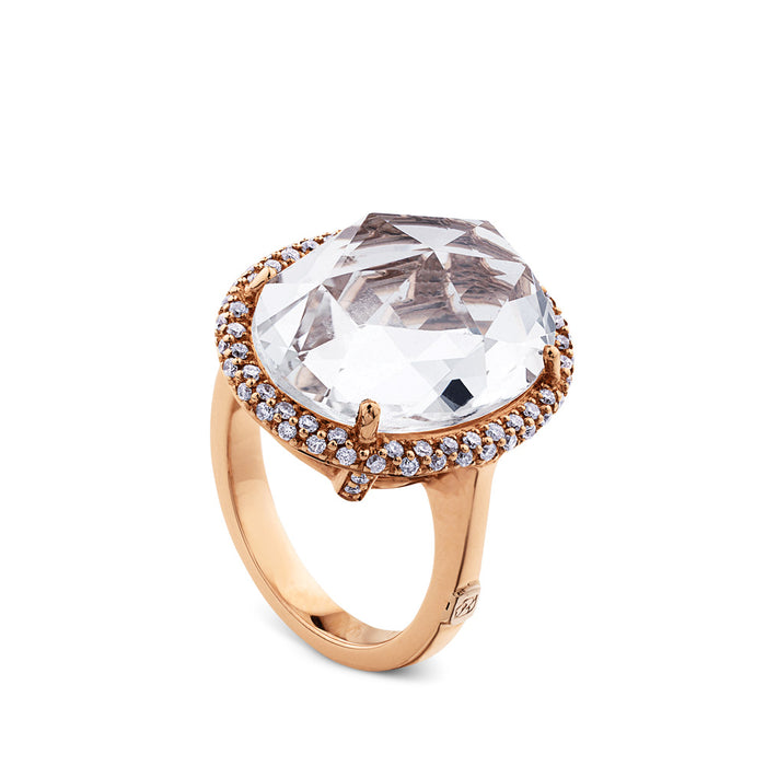 Sortija de oro rosa con topacio blanco y orla de diamantes