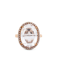 Sortija de oro rosa con topacio blanco y orla de diamantes