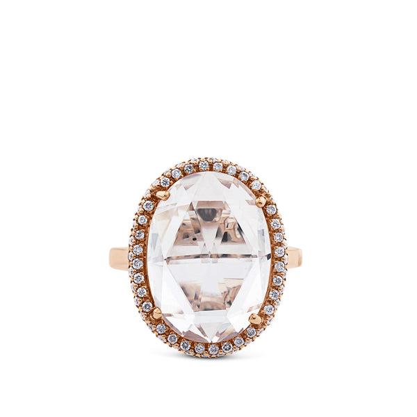 Sortija de oro rosa con topacio blanco y orla de diamantes