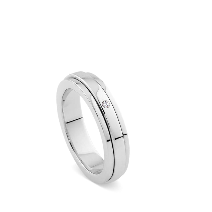 Alianza de oro blanco con diamante engastado