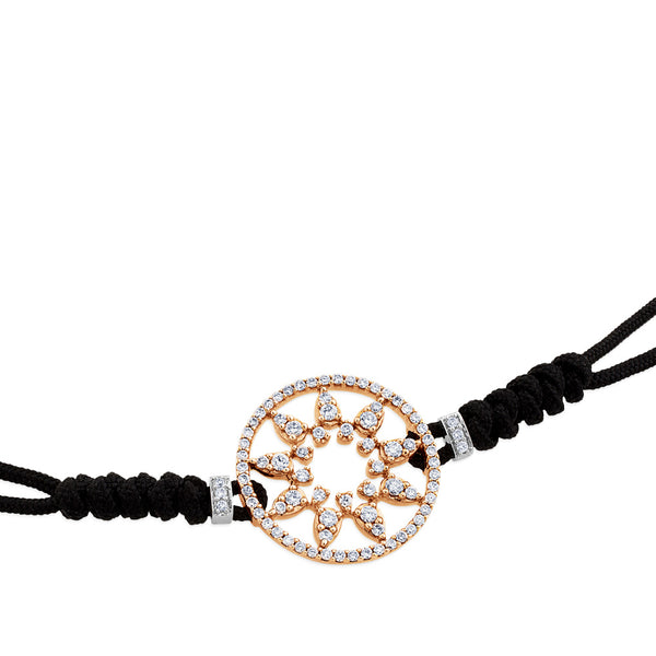 Pulsera de oro rosa y cordón negro con estrella en aro de pavé de diamantes