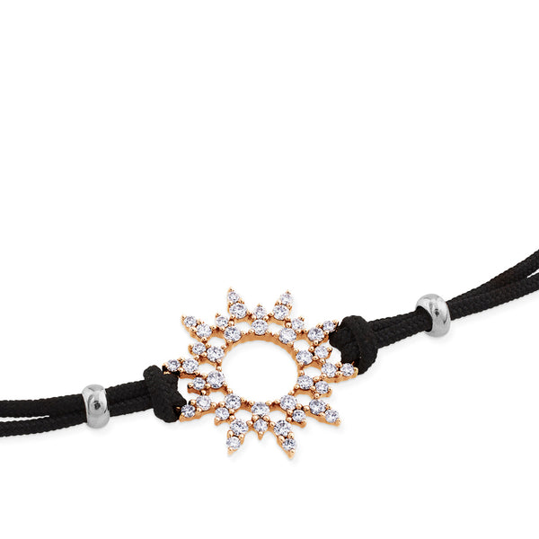 Pulsera de oro rosa y cordón negro con sol de pavé de diamantes