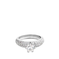 Solitario de oro blanco con 6 garras y pavé de diamantes laterales