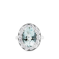 Sortija de oro blanco con aguamarina oval y orla de diamantes