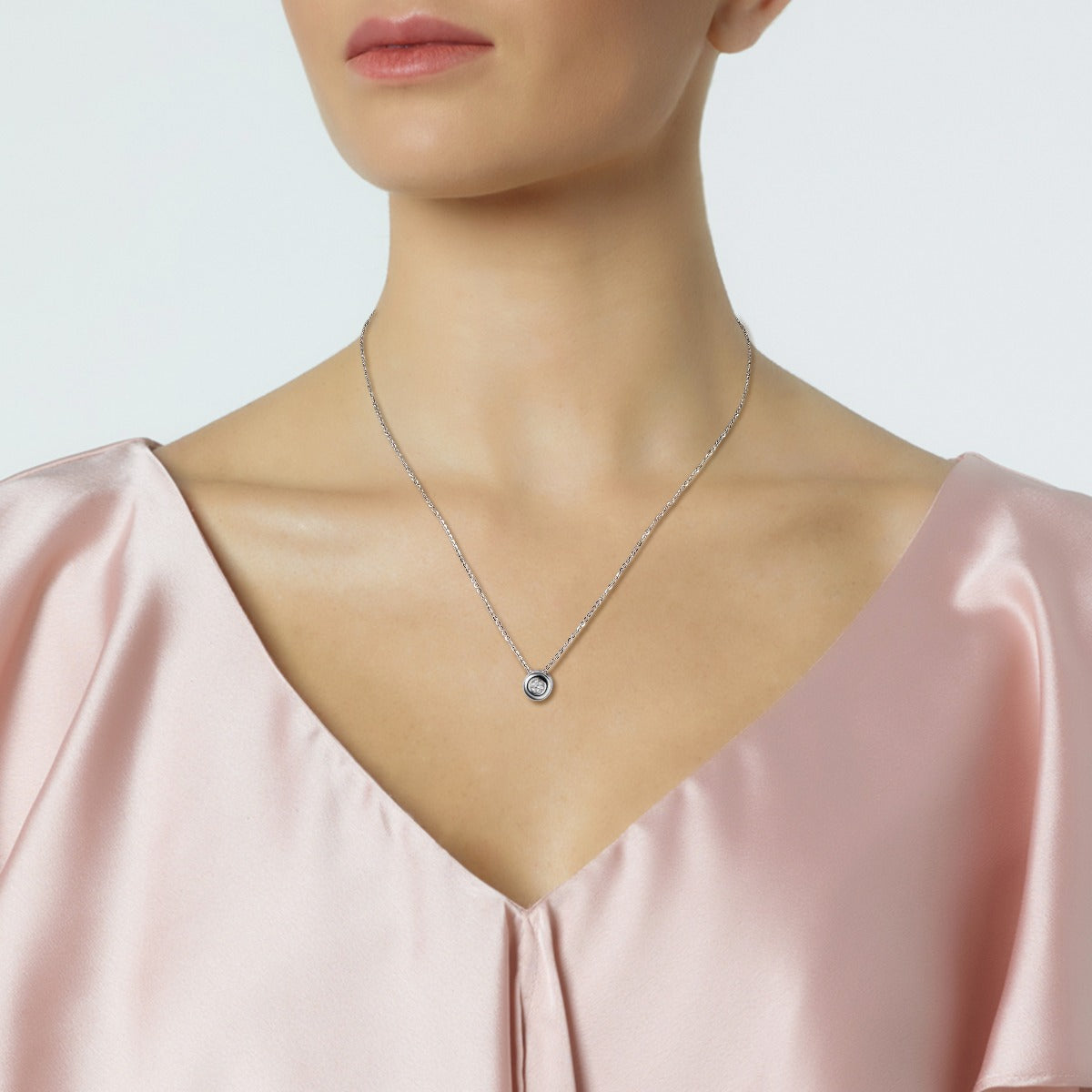 Colgante  con diamante en chatón 0.21 quilates
