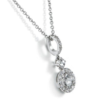 Colgante de oro blanco con diamante y orla de brillantes- Ref J5252CLB_Chocrón Joyeros