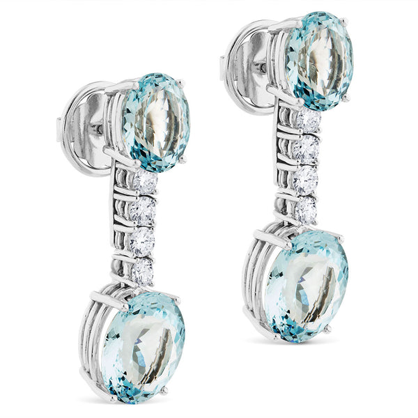 Pendientes largos de oro blanco con diamantes y aguamarinas ovales