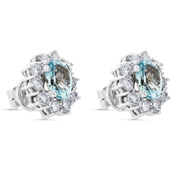 Pendientes de oro blanco con aguamarina y orla de 20 diamantes