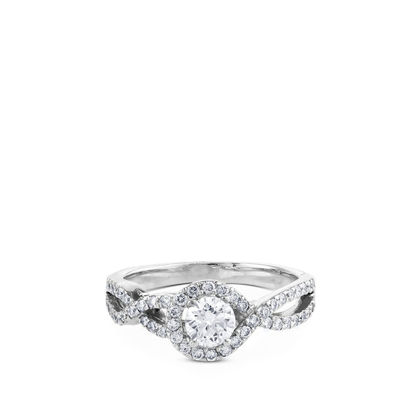 Solitario "Paola" de oro blanco con diamante central en garra y pavé en montura