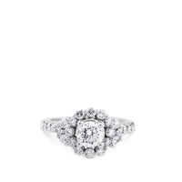 Sortija de oro blanco con diamante central y diamantes laterales