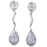 2 Diamantes talla pera, diamantes talla baguette y diamantes talla brillante 