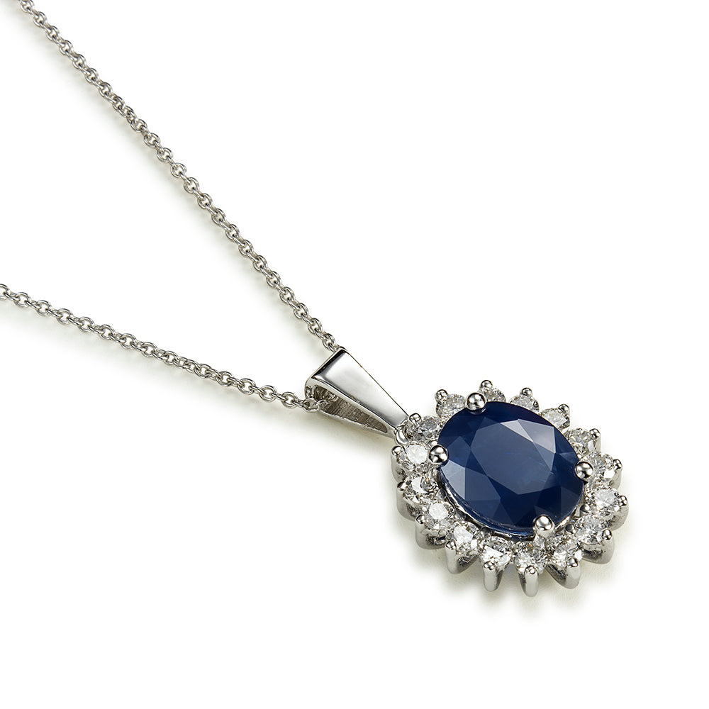 Colgante "Royal Trilogy" de oro blanco con zafiro oval y orla de diamantes