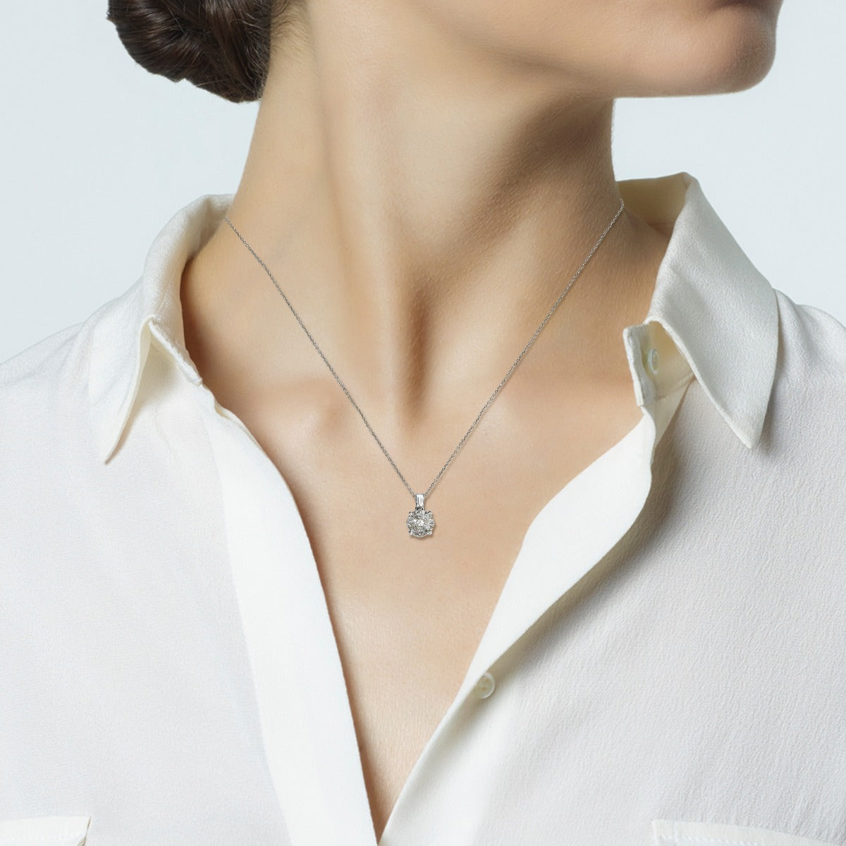 Colgante Bouquet  de oro blanco con diamantes y engaste invisible en 8 garras