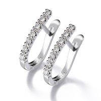 Pendientes de aro ovales de oro blanco con diamantes 0.19 quilates