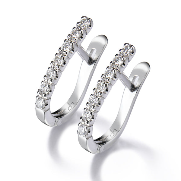Pendientes de aro ovales de oro blanco con diamantes 0.19 quilates