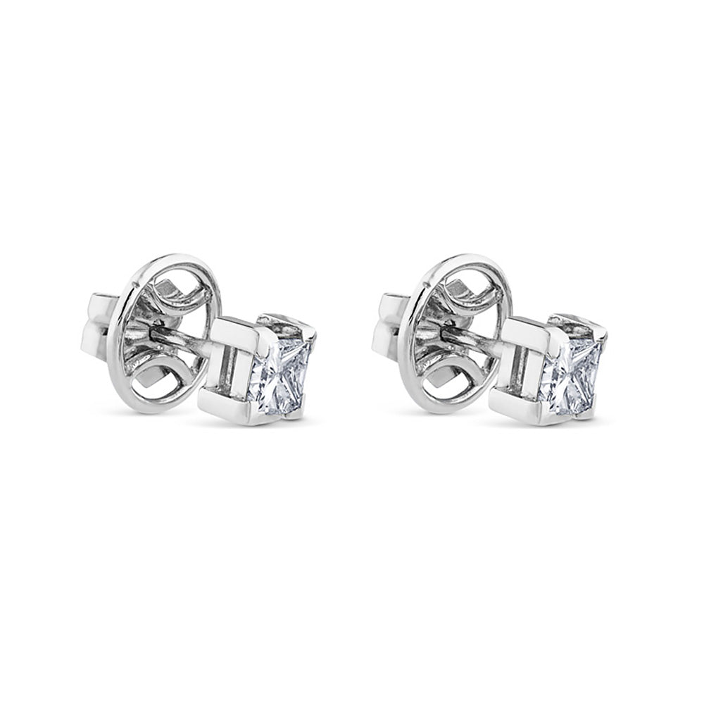 Pendientes de oro blanco con diamantes talla princesa 0.52 quilates
